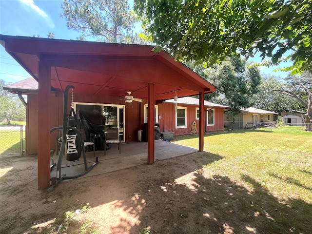 309 Bellaire Dr, Denton, TX 76209 - rear view of house with ceiling fan and a patio