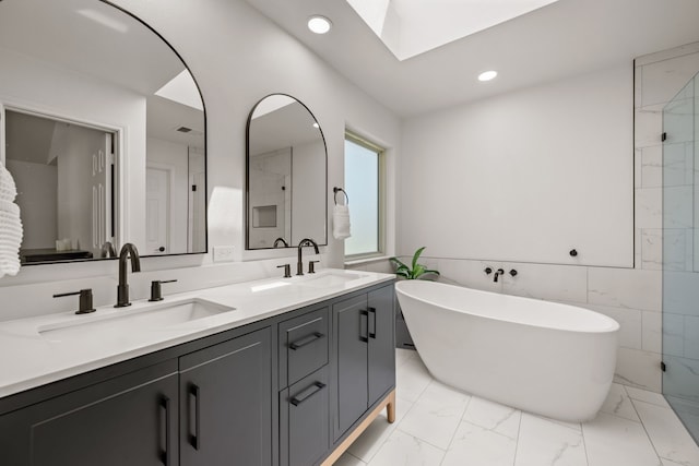 1402 Summer Dell Ct, Keller, TX 76262 - full bathroom with a soaking tub, marble look tile flooring, double vanity, recessed lighting, and a shower