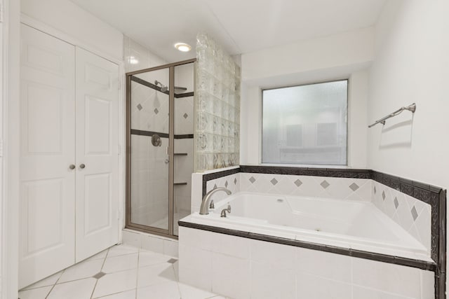 2521 Misty Glen Dr, Flower Mound, TX 75028 - bathroom featuring a whirlpool tub, a shower stall, and tile patterned flooring