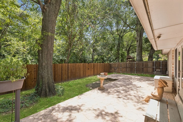 2521 Misty Glen Dr, Flower Mound, TX 75028 - fenced backyard featuring a patio