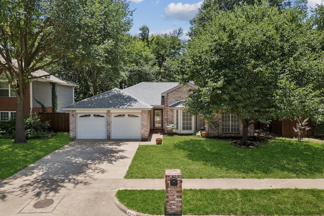 2521 Misty Glen Dr, Flower Mound, TX 75028 - view of front of home featuring an attached garage, concrete driveway, brick siding, and roof with shingles