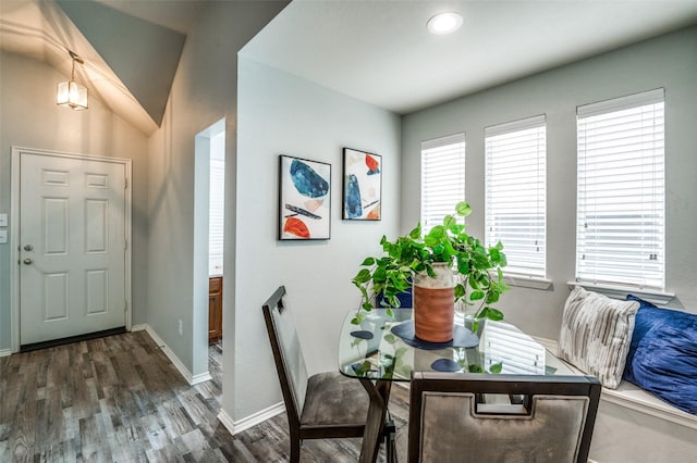 9938 Wethers Field Cir, Providence Village, TX 76227 - dining space featuring dark wood-style flooring, lofted ceiling, and recessed lighting