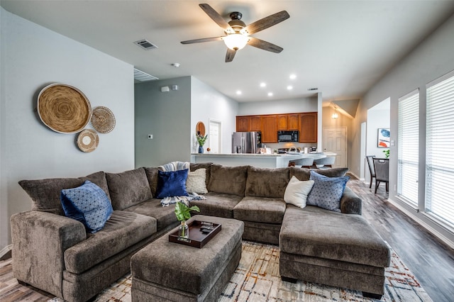 9938 Wethers Field Cir, Providence Village, TX 76227 - living area with healthy amount of natural light, light wood-type flooring, a ceiling fan, and recessed lighting