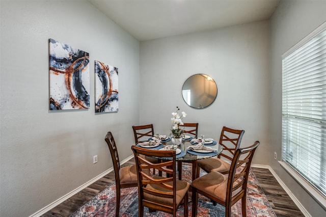 9938 Wethers Field Cir, Providence Village, TX 76227 - dining room with dark wood-style floors and baseboards