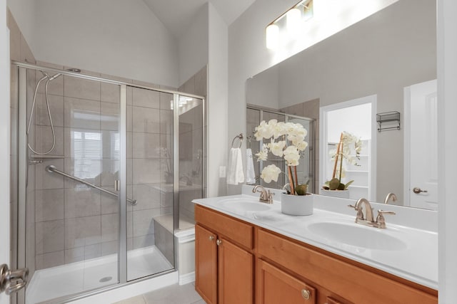 813 Louisville Rd, Savannah, TX 76227 - bathroom featuring a shower stall and double vanity
