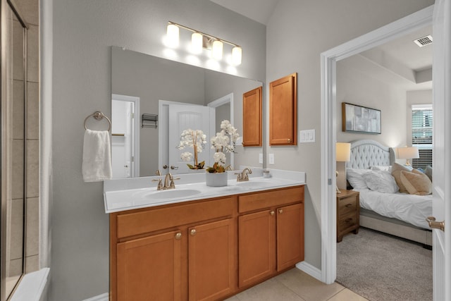 813 Louisville Rd, Savannah, TX 76227 - ensuite bathroom featuring double vanity, tile patterned flooring, and a shower