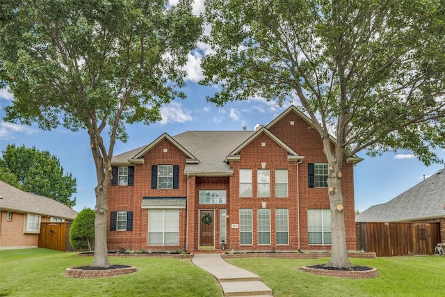 4513 Southpointe Dr, Richardson, TX 75082 - view of front facade with brick siding and roof with shingles