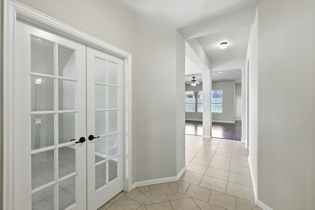 4000 Barnhill Ct, Denton, TX 76208 - hall featuring french doors and light tile patterned floors