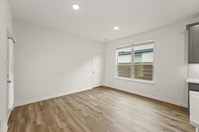 1900 Twisted Tree Ln, Mesquite, TX 75181 - unfurnished bedroom featuring light wood-style floors and recessed lighting