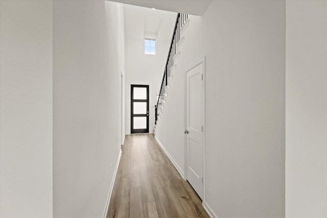 1900 Twisted Tree Ln, Mesquite, TX 75181 - hallway with wood finished floors and a towering ceiling