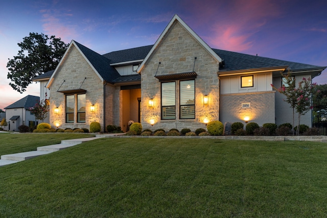 1454 Sunset Point Dr, Flower Mound, TX 75022 - view of front of property featuring stone siding, a standing seam roof, a yard, roof with shingles, and a metal roof