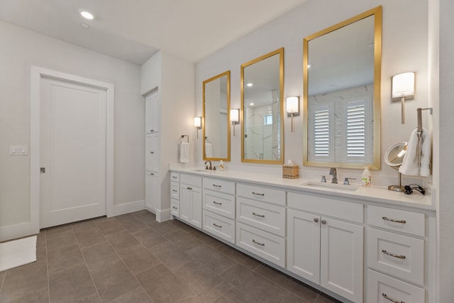 1454 Sunset Point Dr, Flower Mound, TX 75022 - bathroom featuring double vanity, a shower with shower door, tile patterned floors, and recessed lighting