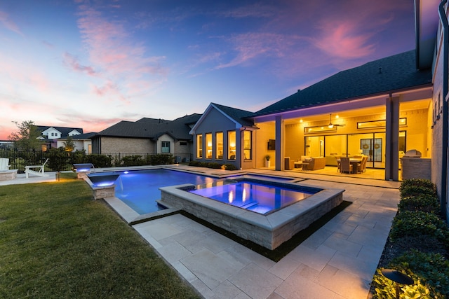 1454 Sunset Point Dr, Flower Mound, TX 75022 - pool at dusk with a patio and a pool with connected hot tub