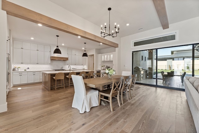 1454 Sunset Point Dr, Flower Mound, TX 75022 - dining space with beam ceiling, light wood-style floors, a chandelier, and recessed lighting