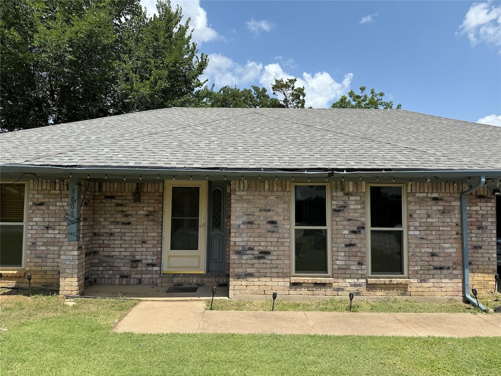 3805 Rustic Forest Trl, Arlington, TX 76016 - view of front of house featuring roof with shingles and brick siding