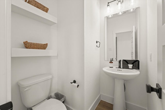2100 Jade Forest Ln, Mesquite, TX 75181 - bathroom with toilet and wood finished floors