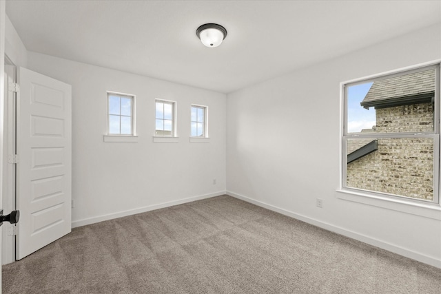 2100 Jade Forest Ln, Mesquite, TX 75181 - spare room featuring healthy amount of natural light and carpet floors