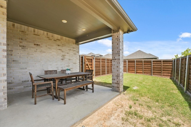 2100 Jade Forest Ln, Mesquite, TX 75181 - fenced backyard with a patio area and outdoor dining space