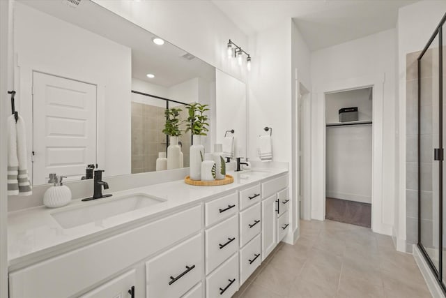 2100 Jade Forest Ln, Mesquite, TX 75181 - bathroom with a stall shower, double vanity, tile patterned flooring, and recessed lighting