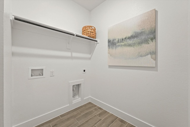2100 Jade Forest Ln, Mesquite, TX 75181 - laundry area featuring hookup for an electric dryer, hookup for a washing machine, and wood tiled floors