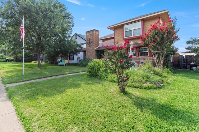2913 David Dr, Rowlett, TX 75088 - view of front facade with a chimney and brick siding