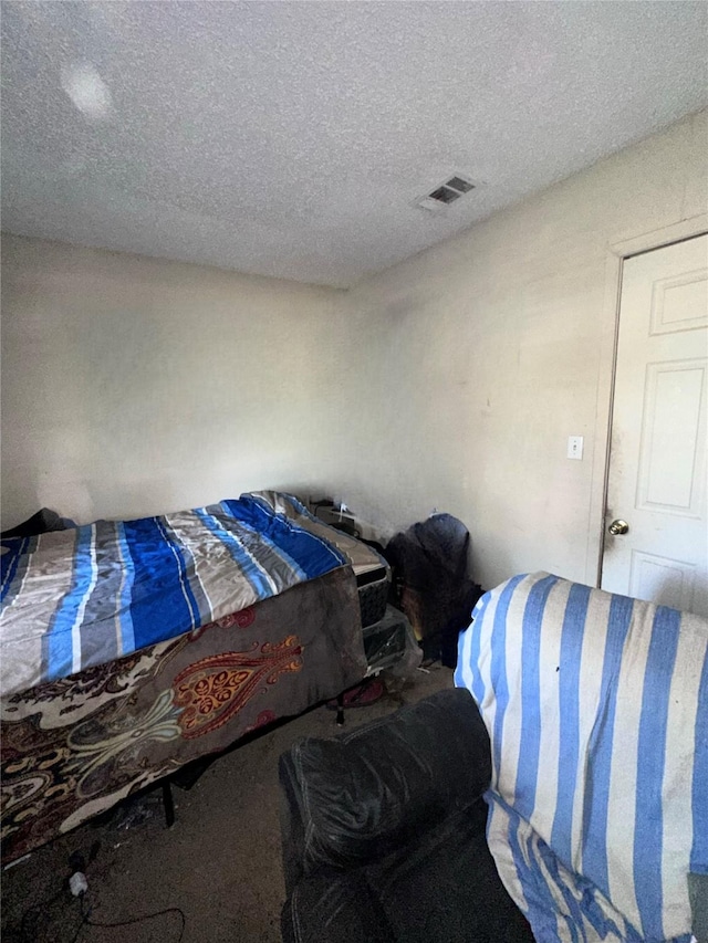 116 Maxwell Rd, Hackberry, TX 75036 - bedroom with a textured ceiling