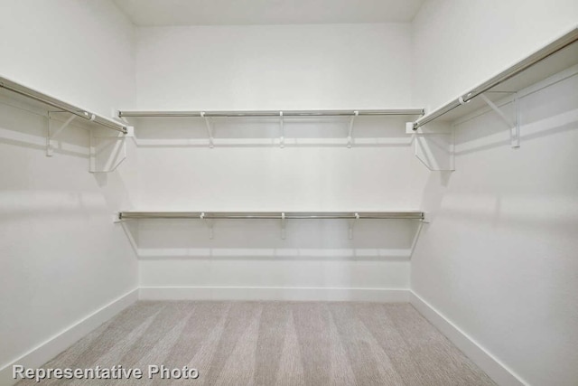 3613 Barrel Ln, Aubrey, TX 76227 - walk in closet featuring carpet