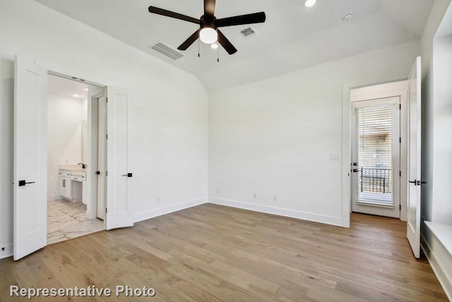3613 Barrel Ln, Aubrey, TX 76227 - unfurnished bedroom featuring light wood finished floors, lofted ceiling, recessed lighting, connected bathroom, and ceiling fan
