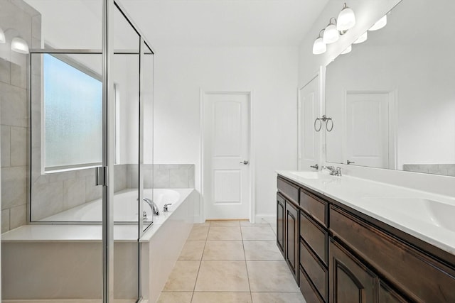 3901 Tule Ranch Rd, Fort Worth, TX 76262 - bathroom with a garden tub, double vanity, a stall shower, and tile patterned floors