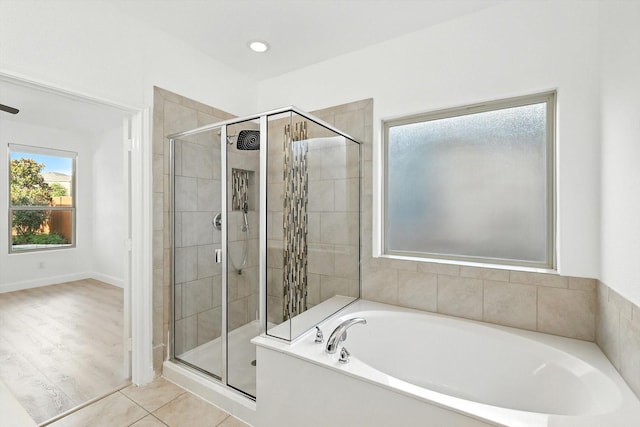 3901 Tule Ranch Rd, Fort Worth, TX 76262 - bathroom featuring a bath, a shower stall, and tile patterned floors