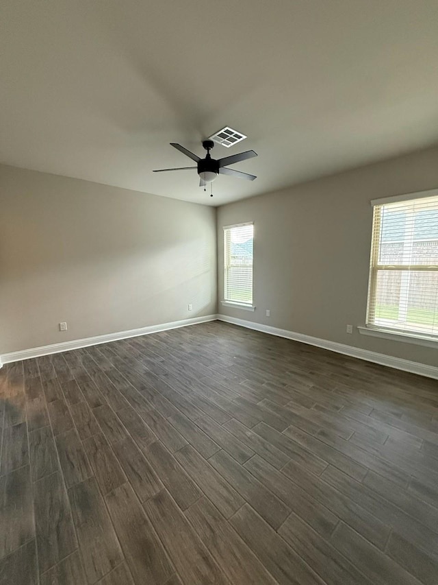 724 Esau Ave, Bossier City, LA 71111 - unfurnished room with dark wood-style floors and ceiling fan
