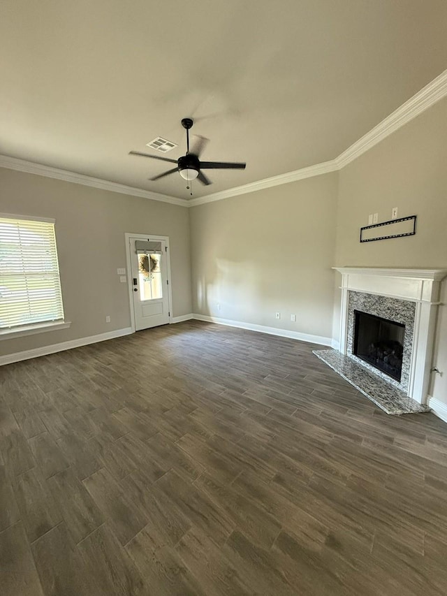 724 Esau Ave, Bossier City, LA 71111 - unfurnished living room with a ceiling fan, crown molding, a premium fireplace, and dark wood-style floors
