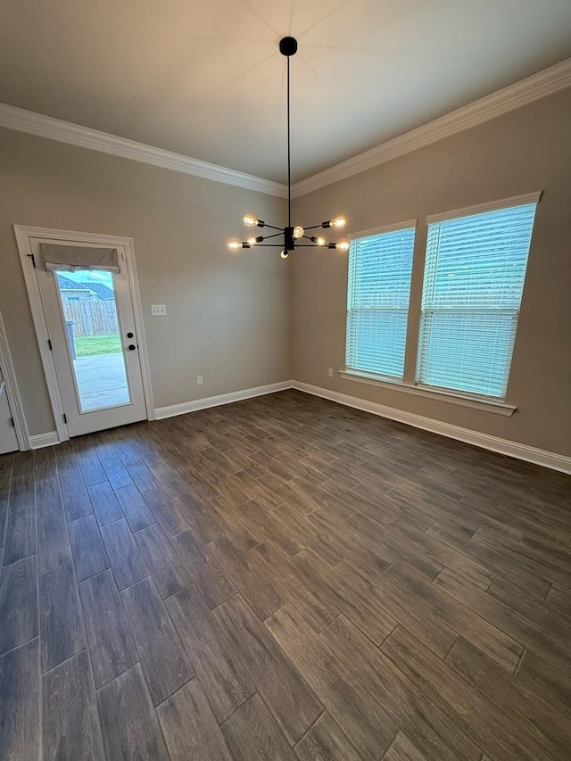 724 Esau Ave, Bossier City, LA 71111 - unfurnished room featuring ornamental molding, a chandelier, and dark wood-style flooring