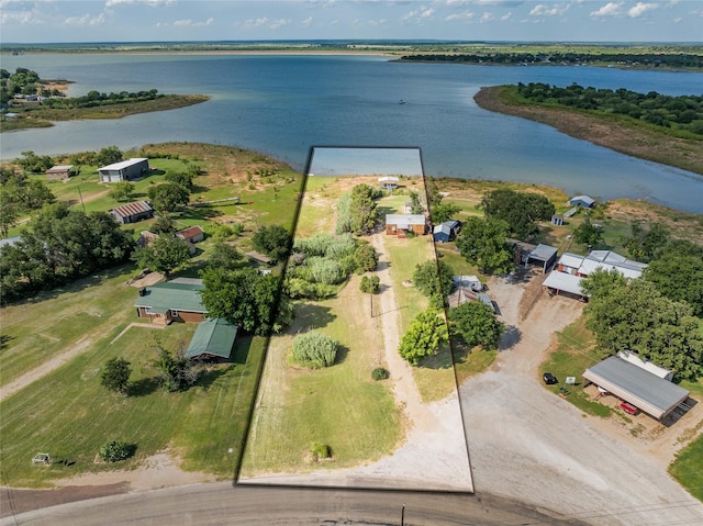 9504 County Road 197, Breckenridge, TX 76424 - aerial view of property and surrounding area featuring a large body of water and property parcel outlined