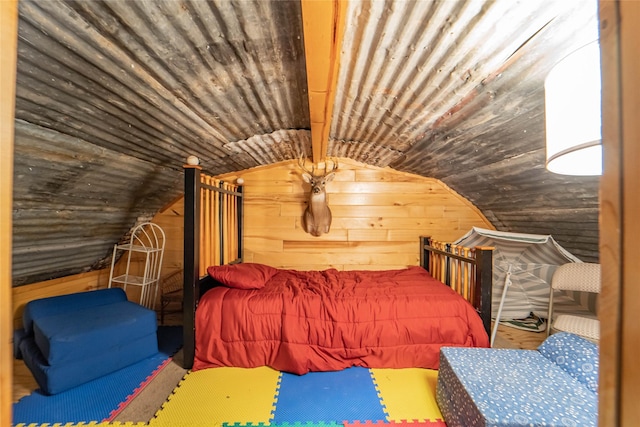 9504 County Road 197, Breckenridge, TX 76424 - bedroom with lofted ceiling and wooden walls