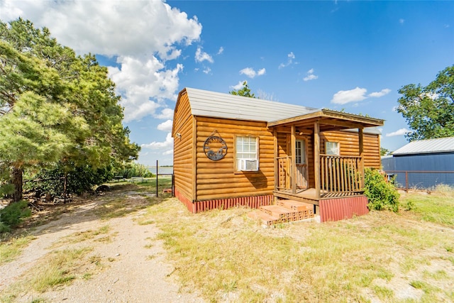 9504 County Road 197, Breckenridge, TX 76424 - view of front of home with log veneer siding