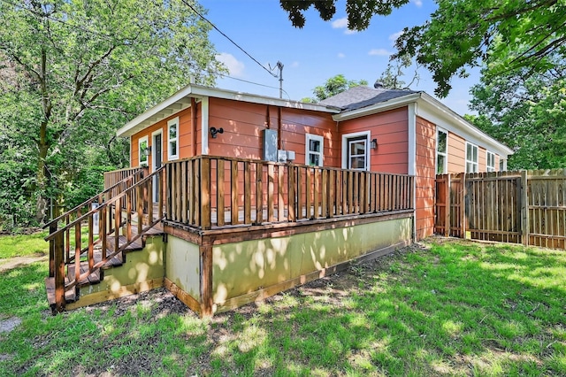 1326 W Bond St, Denison, TX 75020 - rear view of property featuring a wooden deck