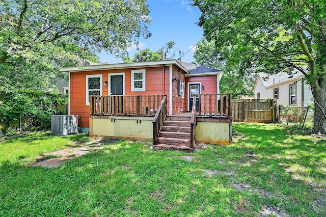 1326 W Bond St, Denison, TX 75020 - back of property featuring a wooden deck