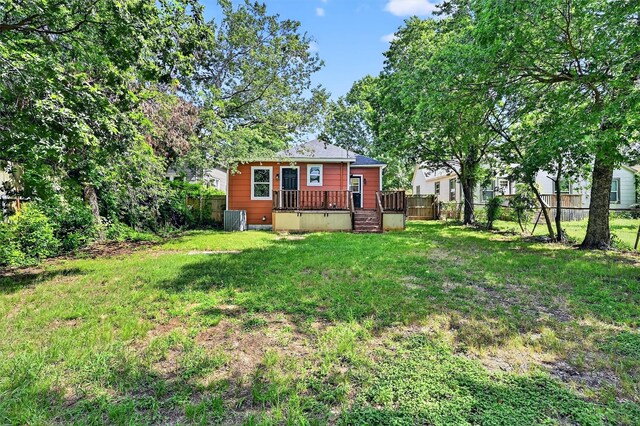 1326 W Bond St, Denison, TX 75020 - view of yard with a wooden deck
