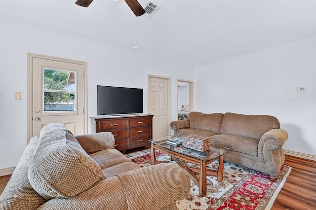 1326 W Bond St, Denison, TX 75020 - living room with light wood finished floors and ceiling fan
