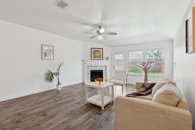913 Lovebird Ln, Little Elm, TX 75068 - living area with a ceiling fan, dark wood-type flooring, a fireplace, and vaulted ceiling