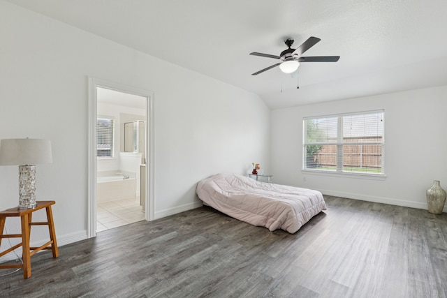 913 Lovebird Ln, Little Elm, TX 75068 - bedroom with wood finished floors, ensuite bath, and a ceiling fan