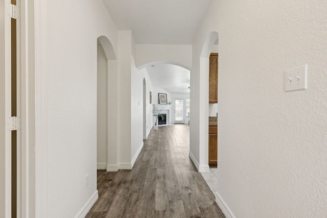 913 Lovebird Ln, Little Elm, TX 75068 - hall with wood finished floors and arched walkways