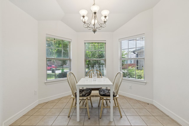 913 Lovebird Ln, Little Elm, TX 75068 - dining area with a chandelier, healthy amount of natural light, vaulted ceiling, and light tile patterned floors