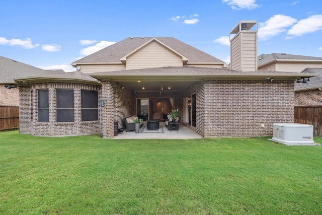 4652 Man O War Rd, Carrollton, TX 75010 - rear view of property featuring brick siding, a patio, a chimney, and roof with shingles