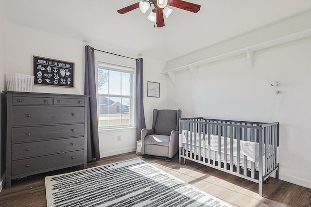 7910 Stone Ridge Dr, Northlake, TX 76247 - bedroom featuring wood finished floors, a nursery area, and ceiling fan