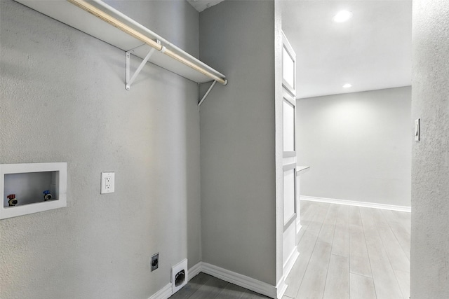 216 N Dobson St, Burleson, TX 76028 - laundry room with washer hookup, hookup for an electric dryer, wood finished floors, and recessed lighting