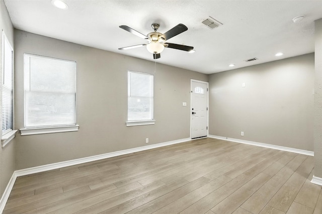 216 N Dobson St, Burleson, TX 76028 - unfurnished room featuring a ceiling fan, light wood-style flooring, recessed lighting, and a smoke detector