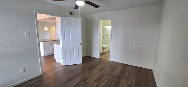 4484 Chaha Rd Unit 103, Garland, TX 75043 - unfurnished bedroom featuring dark wood-type flooring, ensuite bath, and ceiling fan