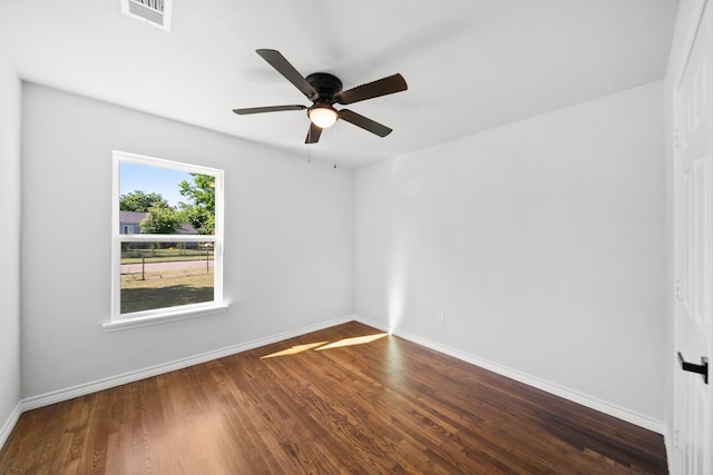 407 Bradley St, Dallas, TX 75224 - empty room featuring dark wood-style floors and ceiling fan